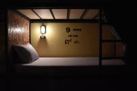 Postel nebo postele na pokoji v ubytování Hide Bangkok Hostel