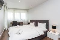 Posteľ alebo postele v izbe v ubytovaní Oxygen Residence