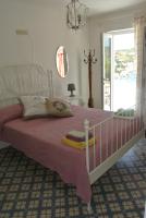 A bed or beds in a room at Casa Carmela