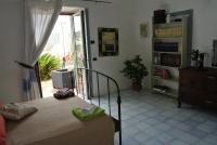 A bed or beds in a room at Casa Carmela