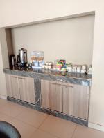 Kuchyň nebo kuchyňský kout v ubytování Savwa Lodges and Apartments