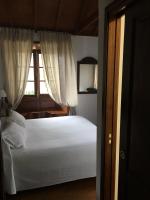 Łóżko lub łóżka w pokoju w obiekcie Hotel Rural Ibo Alfaro - OFFLINE HOTEL