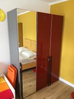 A bed or beds in a room at Alte Post Greifenstein
