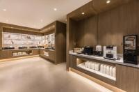 a kitchen with aasteryasteryasteryasteryasteryasteryasteryasteryasteryasteryasteryastery at Hanting Premium Hotel Shanghai West Yingao Road Subway Station in Baoshan