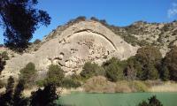 a mountain with a lake in front of it at Hostal Caminito del Rey in Alora