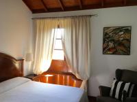 Łóżko lub łóżka w pokoju w obiekcie Hotel Rural Ibo Alfaro - OFFLINE HOTEL