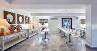 a dining room with white tables and chairs at Delamar 4*Sup-Adults only (18+) in Lloret de Mar