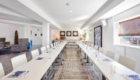 a long dining room with white tables and chairs at Delamar 4*Sup-Adults only (18+) in Lloret de Mar