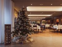 Un restaurant sau alt loc unde se poate mânca la Gasthaus Badhof - Golfhotel