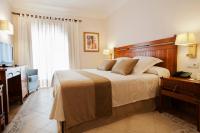 A bed or beds in a room at Princesa Yaiza Suite Hotel Resort