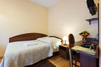 Posteľ alebo postele v izbe v ubytovaní Hotel Victoria