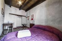 A bed or beds in a room at Casa Masini