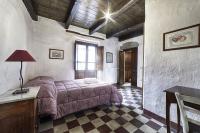 A bed or beds in a room at Casa Masini