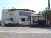 a large white building with a bird in front of it at Ayia Napa Marina Luxury Villas - Pearl in Ayia Napa