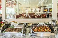 a buffet line with many different types of food at Gran Hotel De Lago - Lago Agrio in Nueva Loja