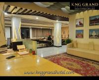 a living room with a couch and a table at Hotel KNG Grand in Fatehpur Sīkri