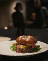 a breakfast sandwich on a plate on a table at Hotel Kittilä in Kittilä