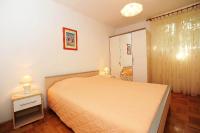 Posteľ alebo postele v izbe v ubytovaní Apartments Luka & Sara