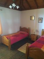 Postel nebo postele na pokoji v ubytování Casa Óscar