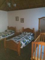 Postel nebo postele na pokoji v ubytování Casa Óscar