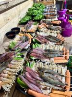 a bunch of different types of vegetables on a table at MIAN FARM & GLAMPING Mui Ne in Ấp Nhơn Hòa