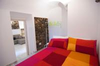 A bed or beds in a room at Apollo Home
