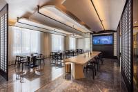 Una televisión o centro de entretenimiento en Jin Yi Hotel, Ordos Dongsheng District Branch