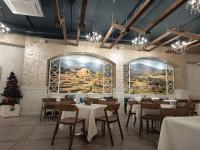Un restaurant sau alt loc unde se poate mânca la Glamping Alliance Hotel