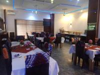 Un restaurant sau alt loc unde se poate mânca la De Baylux Hotel and Suites, Lekki, Lagos