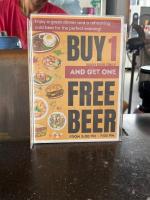 Un certificado, premio, letrero u otro documento en Us Hostel Samui