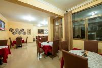 TV a/nebo společenská místnost v ubytování Garr Hotel