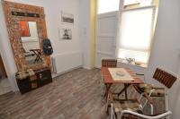 Posedenie v ubytovaní Olive Tree City Apartment