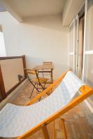 Un balcon sau o teras&#x103; la Malibu OceanView Homestay