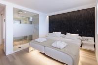 Postel nebo postele na pokoji v ubytování Sud Ibiza Suites