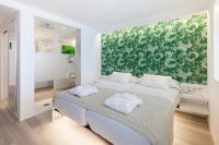 Postel nebo postele na pokoji v ubytování Sud Ibiza Suites