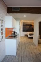 Kuchyň nebo kuchyňský kout v ubytování Maddiola Apartment