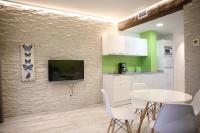 Kuchyň nebo kuchyňský kout v ubytování Maddiola Apartment