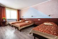 Łóżko lub łóżka w pokoju w obiekcie Hotel Irys