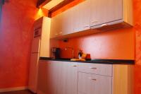 Kuchyň nebo kuchyňský kout v ubytování Maddiola Apartment