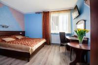 Łóżko lub łóżka w pokoju w obiekcie Hotel Irys