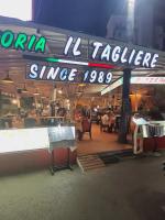 een restaurant met een bord waarop 'caffe ix cafetaria' staat bij Spice & Sea Resort in Kata Beach