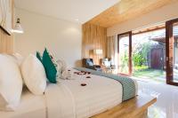 Theanna Villa and Spa Cangguにあるベッド