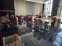 En restaurant eller et andet spisested på Lan Ting massage hotel