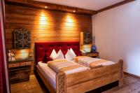 A bed or beds in a room at Solaia Hotel & Guesthouse