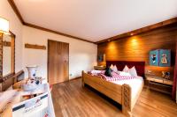 A bed or beds in a room at Solaia Hotel & Guesthouse