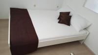 Postel nebo postele na pokoji v ubytování Apartments Rotim
