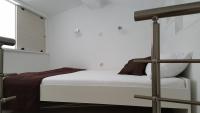 Postel nebo postele na pokoji v ubytování Apartments Rotim