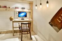 A television and/or entertainment centre at Designer - A10