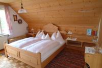Posteľ alebo postele v izbe v ubytovaní Wirtshaus Jagawirt
