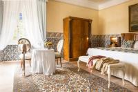 Posteľ alebo postele v izbe v ubytovaní Castello Di Spessa - Residenze d'epoca